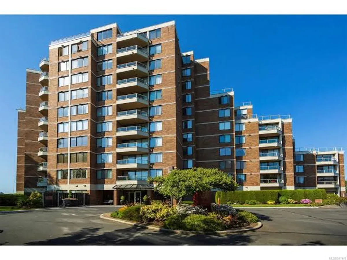 A multi-storey strata building with balconies on every elevation